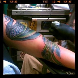 coloring peacock arm tattoo